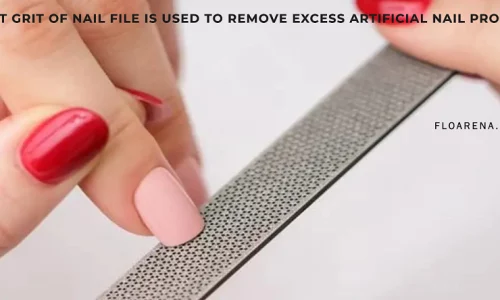 What grit of nail file is used to remove excess artificial nail product?