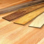 In the world of interior aesthetics, nothing quite matches the allure of black wood flooring. It's elegant, and bold, and adds an undeniable charm to any space. But what happens when an unexpected stain threatens to tarnish its beauty? Fret not! In this guide, we're shedding light on methods for black wood flooring stain removal. Whether you're a DIY enthusiast or leaning towards professional help, we've got you covered. Let's explore how best to maintain the pristine condition of your wood floor and keep it looking its best for years to come. DIY Stain Removal Techniques You'd be surprised at how many household products can double up as stain removers. One example is a mixture of vinegar and olive oil. The vinegar breaks down the black stain while the oil nourishes the wood. Another DIY solution is hydrogen peroxide, which is a great bleaching agent. It's important to test these DIY solutions on an inconspicuous part of your floor first to avoid unintentional damage. If the stain persists after your DIY attempts, it might be time to call in the professionals. The Role of Sanding in Stain Removal Sanding is a common method used in both DIY and professional stain removal. It involves removing the top layer of the wood where the stain is present. This method is effective but should be carried out cautiously as it can thin the wood if overdone. One good thing about sanding is that it provides a fresh, even base for applying a new stain or finish. This can breathe new life into your wood flooring. Staining After Stain Removal Once the stain is removed, you might want to consider re-staining your wood floor to restore its original beauty. There are a variety of wood stains on the market, such as Minwax, which offers a range of colors and finishes. The Pros and Cons of DIY Stain Removal While DIY stain removal can save you money, it can also be time-consuming and labor-intensive. Without the proper knowledge, you could potentially cause more harm than good to your wood floor. On the upside, DIY methods allow you to take control of the process and work at your own pace. They can also be quite satisfying when you see the fruits of your labor! The Pros and Cons of Professional Stain Removal Hiring a flooring specialist to remove your wood floor stain can be more expensive than doing it yourself. The upside is that you're guaranteed quality work. Professionals have the knowledge dealing with different types of wood stains, experience, and tools to effectively remove stains and restore your floor's appearance. However, you'll need to make sure you're home when they're working and be ready for the noise and dust that comes with professional wood floor restoration. When to Call in the Pros Despite our best efforts, the stain just won't budge. This is when it's time to call in the professionals. Professional wood floor cleaners have the expertise and equipment to handle stubborn stains. They can also assess the extent of the damage and recommend whether a full floor restoration is needed. The Best Approach for Removing Black Wood Flooring Stains When it comes to removing black stains from wood flooring, it is vital to weigh the pros and cons of DIY methods versus professional services. While DIY methods may be cost-effective, professional services offer expertise and efficiency. If you want a hassle-free and guaranteed result, consider hiring a professional for black wood flooring stain removal. Don't let those stains linger any longer, make the choice today. Keep browsing our website for more helpful articles