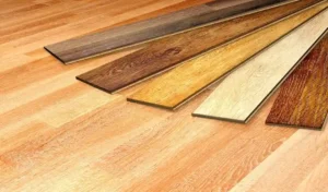 In the world of interior aesthetics, nothing quite matches the allure of black wood flooring. It's elegant, and bold, and adds an undeniable charm to any space. But what happens when an unexpected stain threatens to tarnish its beauty? Fret not! In this guide, we're shedding light on methods for black wood flooring stain removal. Whether you're a DIY enthusiast or leaning towards professional help, we've got you covered. Let's explore how best to maintain the pristine condition of your wood floor and keep it looking its best for years to come. DIY Stain Removal Techniques You'd be surprised at how many household products can double up as stain removers. One example is a mixture of vinegar and olive oil. The vinegar breaks down the black stain while the oil nourishes the wood. Another DIY solution is hydrogen peroxide, which is a great bleaching agent. It's important to test these DIY solutions on an inconspicuous part of your floor first to avoid unintentional damage. If the stain persists after your DIY attempts, it might be time to call in the professionals. The Role of Sanding in Stain Removal Sanding is a common method used in both DIY and professional stain removal. It involves removing the top layer of the wood where the stain is present. This method is effective but should be carried out cautiously as it can thin the wood if overdone. One good thing about sanding is that it provides a fresh, even base for applying a new stain or finish. This can breathe new life into your wood flooring. Staining After Stain Removal Once the stain is removed, you might want to consider re-staining your wood floor to restore its original beauty. There are a variety of wood stains on the market, such as Minwax, which offers a range of colors and finishes. The Pros and Cons of DIY Stain Removal While DIY stain removal can save you money, it can also be time-consuming and labor-intensive. Without the proper knowledge, you could potentially cause more harm than good to your wood floor. On the upside, DIY methods allow you to take control of the process and work at your own pace. They can also be quite satisfying when you see the fruits of your labor! The Pros and Cons of Professional Stain Removal Hiring a flooring specialist to remove your wood floor stain can be more expensive than doing it yourself. The upside is that you're guaranteed quality work. Professionals have the knowledge dealing with different types of wood stains, experience, and tools to effectively remove stains and restore your floor's appearance. However, you'll need to make sure you're home when they're working and be ready for the noise and dust that comes with professional wood floor restoration. When to Call in the Pros Despite our best efforts, the stain just won't budge. This is when it's time to call in the professionals. Professional wood floor cleaners have the expertise and equipment to handle stubborn stains. They can also assess the extent of the damage and recommend whether a full floor restoration is needed. The Best Approach for Removing Black Wood Flooring Stains When it comes to removing black stains from wood flooring, it is vital to weigh the pros and cons of DIY methods versus professional services. While DIY methods may be cost-effective, professional services offer expertise and efficiency. If you want a hassle-free and guaranteed result, consider hiring a professional for black wood flooring stain removal. Don't let those stains linger any longer, make the choice today. Keep browsing our website for more helpful articles